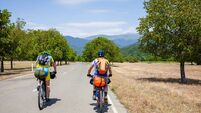 Mountain bikers are travelling in the highlands of Tusheti region, Georgia