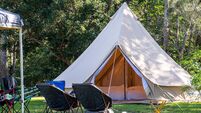 Glamping camping teepee tent and chairs at the campsite