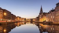 The River Lee in Cork City, Ireland at Night.