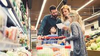 Family shopping in supermarket