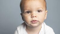 Contemplative Eleven Month Old Baby Boy