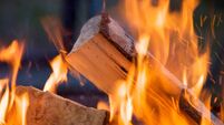 Close up shot of a burning piece of wood