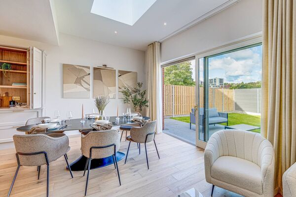 Extra high ceilings and roof light in the dining/family area to the back Extra high ceilings and roof light in the dining/family area to the back