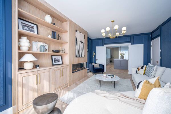 Living area links to kitchen/dining/family via solid double doors Living area links to kitchen/dining/family via solid double doors