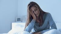 Depressed woman awake in the night