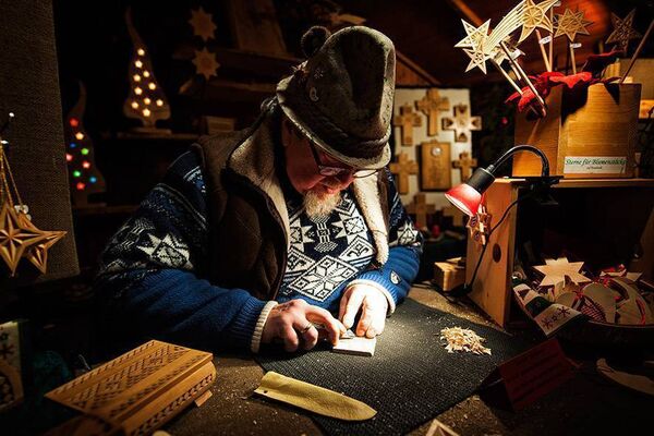 Wood carving at a Christmas market. Photograph: Florian Trykowski. ©DZT/Florian Trykowski Wood carving at a Christmas market. Photograph: Florian Trykowski. ©DZT/Florian Trykowski