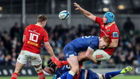 Tadhg Beirne is tackled by Ciarán Frawley 25/11/2023