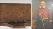 Daniel O'Connell's gun case and general's portrait in the frame 
