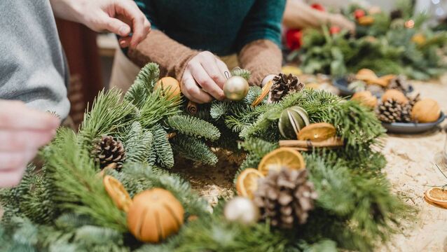 Florists Designing a Christmas Wreath