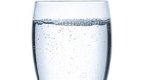 Glass of water on a white backgound