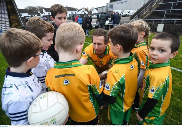 YOUNG AND OLD: Veteran Gary Sice signs autographs for young Corofin supporters after their Connacht semi final win over Ballina Stephenites. Pic: Ray Ryan/Sportsfile YOUNG AND OLD: Veteran Gary Sice signs autographs for young Corofin supporters after their Connacht semi final win over Ballina Stephenites. Pic: Ray Ryan/Sportsfile