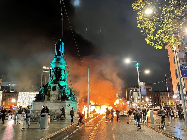 A bus and car on fire on O'Connell Street in Dublin city centre. A bus and car on fire on O'Connell Street in Dublin city centre.