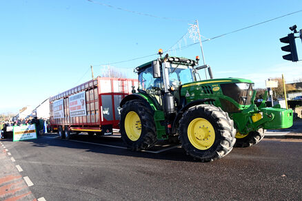 A tractor and trailer leads the march down the main street in Carrigaline. Picture: Larry Cummins A tractor and trailer leads the march down the main street in Carrigaline. Picture: Larry Cummins