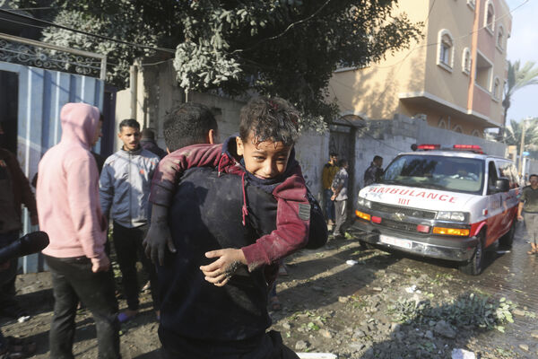 Palestinians evacuate wounded children in Rafah, Gaza Strip. Picture: Hatem Ali/AP Palestinians evacuate wounded children in Rafah, Gaza Strip. Picture: Hatem Ali/AP