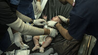 'Hell on Earth has returned to Gaza': Scores reported killed as fighting shatters Israel-Hamas truce