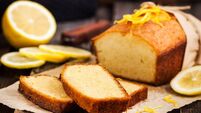 Classic lemon pound cake on rustic wooden background